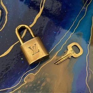 #319 Authentic Louis Vuitton lock and key WORKS